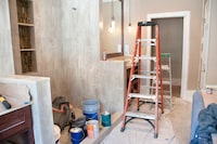 File #: 16160345
Master Bathroom Remodeling: Painting in-Progress
renovations, painting, bathroom, real estate. 
Credit:  iStockphoto

(Royalty-Free)

Keywords: 	Bathroom, Construction, Paint, Home Addition, Domestic Room, Home Improvement, Shower, Incomplete, Tile, Tiled Floor