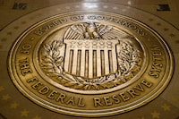 FILE - The seal of the Board of Governors of the United States Federal Reserve System is displayed in the ground at the Marriner S. Eccles Federal Reserve Board Building, Feb. 5, 2018, in Washington. In a report issued Wednesday, June 28, 2023, the nation's 23 largest banks passed the Federal Reserve's so-called "stress tests" this year, a sign that the nation's banking system remains resilient despite the recent banking crisis that led to the failure of Silicon Valley Bank, Signature Bank and First Republic Bank. (AP Photo/Andrew Harnik, File)
