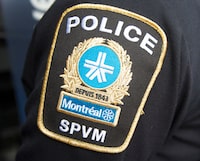 Montreal police and the Quebec Crown prosecutor's office are launching a pilot project to help them better address domestic violence-related strangulations. A Montreal police patch is seen on an officer during a news conference in Montreal, Thursday, March 25, 2021. THE CANADIAN PRESS/Ryan Remiorz