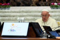 Pope Francis speaks during the First General Congregation of the Synod at the Paul VI Hall at the Vatican, October 4, 2023.    Vatican Media/­Handout via REUTERS    ATTENTION EDITORS - THIS IMAGE WAS PROVIDED BY A THIRD PARTY.
