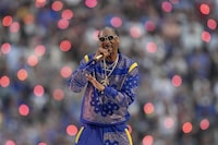 Snoop Dogg performs during halftime of the NFL Super Bowl 56 football game between the Los Angeles Rams and the Cincinnati Bengals Sunday, Feb. 13, 2022, in Inglewood, Calif. (AP Photo/Marcio Jose Sanchez) 