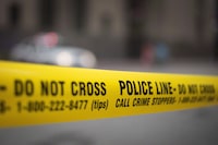Police tape is shown in Toronto on May 2, 2017. Police say a 16-year-old boy has been arrested and charged in a deadly shooting at a city bar in northern Ontario. THE CANADIAN PRESS/Graeme Roy