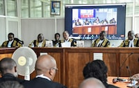 A panel of five Constitutional Court Judges of Uganda led by the Deputy Chief Justice of Uganda Richard Buteera read their joint judgement at the Constitutional Court, where the Court upheld the anti-LGBTQ Law in Kampala, Uganda April 3, 2024. REUTERS/Abubaker Lubowa