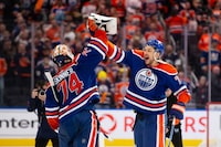 EDMONTON, CANADA - MAY 1: Goaltender Stuart Skinner #74 and Vincent Desharnais #73 of the Edmonton Oilers celebrate a 4-3 victory against the Los Angeles Kings during the third period in Game Five of the First Round of the 2024 Stanley Cup Playoffs at Rogers Place on May 1, 2024, in Edmonton, Canada.  (Photo by Codie McLachlan/Getty Images)