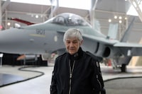 Former RCAF pilot Dee Brasseur, in front of a CF-18 on display at the Canada Aviation and Space Museum March 28, 2024 in Ottawa. She flew this particular  plane #901 during her career. Dave Chan/The Globe and Mail