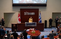 Newly elected Mayor Olivia Chow reacts after receiving a standing ovation during the Declaration of Office Ceremony at Toronto City Hall, on Wednesday, July 12, 2023. THE CANADIAN PRESS/Tijana Martin