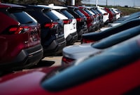 SUVs for sale are seen at an auto mall in Ottawa, on April 26, 2021. DesRosiers Automotive Consultants says auto sales jumped 14.9 per cent in January compared with the year before as manufacturers reported an estimated 112,862 transactions for the month. THE CANADIAN PRESS/Justin Tang