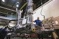 Herouxdevtek source

A worker works at on Landing gear without wheels at the Heroux Devtek plant in Quebec.