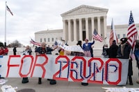 FILE - Supporters of former President Donald Trump protest outside of the Supreme Court on the second anniversary of the Jan. 6, riot at the U.S. Capitol, in Washington, Jan. 6, 2023. All eyes are on the Supreme Court in Donald Trump's federal 2020 election interference case. The conservative-majority Supreme Court's next moves could determine whether the former president stands trial in Washington ahead of the November election.(AP Photo/Jose Luis Magana, File)