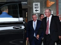 Former U.S. President Donald Trump's Chief of Staff Mark Meadows walks out of the United States District Court for the Northern District of Georgia, where a hearing on his petition to move the Fulton County case to federal court in the 2020 election case took place, in Atlanta, Georgia, U.S., August 28, 2023.  REUTERS/Dustin Chambers