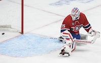 Montreal Canadiens goaltender Sam Montembeault looks back after being scored on by Carolina Hurricanes' Jordan Staal during second period NHL hockey action in Montreal, Saturday, March 30, 2024. THE CANADIAN PRESS/Graham Hughes