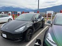 The Tesla Model Y charging in Jasper, Alta.