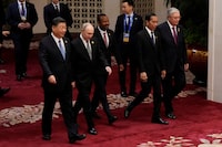 Chinese President Xi Jinping, Russian President Vladimir Putin, Ethiopian Prime Minister Abiy Ahmed, Indonesian President Joko Widodo and Kazakhstan President Kassym-Jomart Tokayev head to a group photo session at the Third Belt and Road Forum at the Great Hall of the People in Beijing,China, October 18, 2023.   Suo Takekuma/Pool via REUTERS