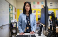 Vanessa Yoon, an accounting and personal finance teacher at York Mills Collegiate Institute, is photographed during class on May 1, 2024. Yoon signed an agreement with parents of students that if phones are a distraction, then the teacher has the right to take the phone away during the duration of class. (Fred Lum/The Globe and Mail)
