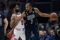 FILE - Brooklyn Nets' Kevin Durant (7) looks to drive against Chicago Bulls' Coby White (0) during the second half of an NBA basketball game Wednesday, Jan. 4, 2023, in Chicago. Chicago won 121-112. The Phoenix Suns pulled a midnight blockbuster on Wednesday, Feb. 9, 2023, acquiring 13-time All-Star Durant from the Brooklyn Nets, according to multiple reports. (AP Photo/Paul Beaty, File)