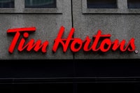 FILE PHOTO: A Tim Hortons logo is pictured in Montreal, Quebec, Canada, October 18, 2019. REUTERS/Carlo Allegri