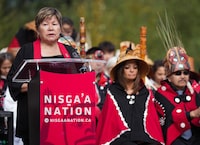 Eva Clayton, president of the Nisga'a Lisims Government, speaks during a homecoming celebration for the House of Ni'isjoohl memorial totem at the Nisga'a Nation, in Laxgalts'ap, B.C., Friday, Sept. 29, 2023. The totem, on display in the National Museum of Scotland in Edinburgh since 1930, was returned to the Nass Valley, which is about 1,400 kilometres northwest of Vancouver, after a journey that included a flight aboard a Canadian Armed Forces aircraft. THE CANADIAN PRESS/Darryl Dyck