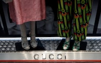  FILE PHOTO: A Gucci sign is seen outside a shop in Rome, April 20, 2023. REUTERS/Remo Casilli/File Photo