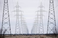 Manitoba Hydro power lines are shown outside Winnipeg, on Monday, May 1, 2018. Manitoba is looking at boosting wind power and encouraging conservation as part of a new long-term energy strategy at Crown-owned Manitoba Hydro. THE CANADIAN PRESS/John Woods