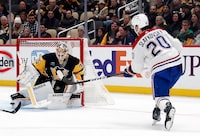 Jan 27, 2024; Pittsburgh, Pennsylvania, USA;  Montreal Canadiens left wing Juraj Slafkovsky (20) scores a power play goal against Pittsburgh Penguins goaltender Tristan Jarry (35) during the second period at PPG Paints Arena. Mandatory Credit: Charles LeClaire-USA TODAY Sports