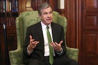 FILE - Democratic North Carolina Gov. Roy Cooper speaks to The Associated Press in a year-end interview at the Executive Mansion in Raleigh, N.C., Dec. 14, 2022. On Friday, June 16, 2023, Cooper vetoed GOP legislation that would ban the promotion of certain beliefs that some lawmakers have likened to critical race theory in state government workplaces. (AP Photo/Hannah Schoenbaum, File)