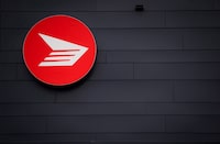 Changes to the federal Competition Act now explicitly label undisclosed fees and surcharges a "harmful business practice," leading to lawsuits against online retailers, movie theatres and even Canada Post. The Canada Post logo is seen outside the company's Pacific Processing Centre, in Richmond, B.C., on June 1, 2017. THE CANADIAN PRESS/Darryl Dyck