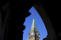 The Canadian flag flies on top of the Peace Tower on Parliament Hill in Ottawa on Monday, March 6, 2023. THE CANADIAN PRESS/Sean Kilpatrick