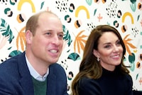 FILE PHOTO: Britain's Kate, Princess of Wales, and Prince William listen to young adults in the 'Mentor Room' during a visit to the Open Door Charity, a charity focused on supporting young adults across Merseyside with their mental health, using culture and creativity as the catalyst for change in Birkenhead, England, Thursday, Jan. 12, 2023.     Jon Super/Pool via REUTERS/File Photo
