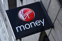 FILE PHOTO: A logo at a branch of Virgin Money bank is seen in London, Britain, March 6, 2013. REUTERS/Toby Melville/File Photo