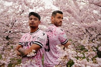 Vancouver FC players Zach Verhoven (left) and Wero Díaz model the Canadian Premier League team’s new alternate kit dubbed the Cherry Blossom Kit in an undated handout photo. A portion of the proceeds from each jersey will be donated to the Pink Shirt Day campaign which raises awareness about bullying.THE CANADIAN PRESS/HO-Beau Chevalier/Vancouver FC **MANDATORY CREDIT** 