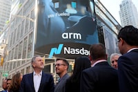 FILE PHOTO: Arm executives and CEO Rene Haas gather outside Nasdaq Market site, as Softbank's Arm, chip design firm, holds an initial public offering (IPO), in New York, U.S., September 14, 2023. REUTERS/Brendan McDermid/File Photo