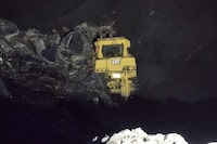 This dozer operated in the CST Coal mine in Grand Cache, Alta., was partially buried in an October 2022 "wall instability." The operator was not injured. Alberta's energy regulator is currently reviewing practices at the mine after three additional instabilities in June, September and October. THE CANADIAN PRESS/HO-United Mine Workers **MANDATORY CREDIT** 