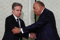 U.S. Secretary of State Antony Blinken shakes hands with Egyptian Foreign Minister Sameh Shoukry, after a joint press conference, during his visit to Cairo, Egypt March 21, 2024. REUTERS/Evelyn Hockstein/Pool