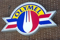 An Olymel sign is shown in Montreal on Tuesday, March 24, 2020, in Montreal. Olymel is closing two plants in Quebec and Ontario and accelerating the closure of another, affecting around 400 employees as the company says it's still facing market challenges.THE CANADIAN PRESS/Ryan Remiorz