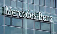 FILE - The Mercedes Benz logo is pictured in Berlin, Germany, June 25, 2021. Mercedes-Benz says it will build its own worldwide electric vehicle charging network starting in North America in a bid to compete with EV sales leader Tesla. (AP Photo/Michael Sohn, File)
