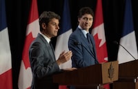 Prime Minister Justin Trudeau listens to French Prime Minister Gabriel Attal deliver his opening remarks during a joint news conference, Thursday, April 11, 2024 in Ottawa. THE CANADIAN PRESS/Adrian Wyld