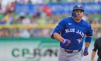 Toronto Blue Jays’ Joey Votto circles the bases after hitting a solo home run off Philadelphia Phillies starter Zack Wheeler during the first inning of a spring training baseball game at BayCare Ballpark, Sunday, March 17, 2024, in Clearwater, Fla. THE CANADIAN PRESS/Steve Nesius