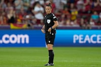 FILE - Referee Rebecca Welch during the Women Euro 2022 group B soccer match between Denmark and Spain at Brentford Community Stadium in London, England, Saturday, July 16, 2022. Welch will become the first female referee in the Premier League when she takes charge of the match between Fulham and Burnley on Dec. 23, 2023. (AP Photo/Alessandra Tarantino, file)