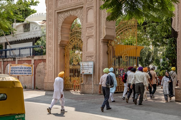 Worshippers arrive at the Gurdwara Rakab Ganj Sahib, a Sikh temple in central New Delhi, India, on September 20, 2023.