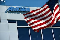 FILE PHOTO: An Amgen sign is seen at the company's office in South San Francisco, California October 21, 2013. REUTERS/Robert Galbraith