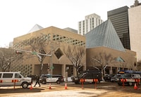 Police surround Edmonton City Hall during an investigation, in Edmonton, Tuesday, Jan. 23, 2024. The building is to reopen to the public on Monday, two months after what police described as a politically motivated attack involving gunfire and Molotov cocktails. THE CANADIAN PRESS/Jason Franson