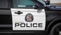A police vehicle is seen at Calgary Police Service headquarters in Calgary on April 9, 2020. Police in riot gear have pulled down some tents at a pro-Palestinian protest at the University of Calgary. THE CANADIAN PRESS/Jeff McIntosh