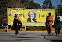 A photograph of late temple president Hardeep Singh Nijjar is seen on a banner outside the Guru Nanak Sikh Gurdwara Sahib, in Surrey, B.C., on Monday, September 18, 2023. Thousands of Sikh voters are expected to turn out today in the Metro Vancouver municipality of Surrey, to vote in an unofficial referendum at the centre of Canada's ongoing tensions with India. THE CANADIAN PRESS/Darryl Dyck
