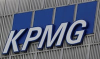 FILE PHOTO: The KPMG logo is seen at their offices at Canary Wharf financial district in London,Britain, March 3, 2016.  REUTERS/Reinhard Krause/File Photo