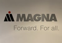 A Magna logo is shown in Milton, Ont. on Saturday, March 24, 2023. THE CANADIAN PRESS/Staff