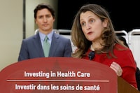 FILE PHOTO: Canada's Deputy Prime Minister and Minister of Finance Chrystia Freeland, with Prime Minister Justin Trudeau, takes part in a news conference after touring a medical training facility in Ottawa, Ontario, Canada, February 7, 2023. REUTERS/Blair Gable/File Photo