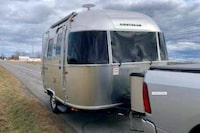 This image provided by the New York State Police shows an Airstream trailer in Brownville, N.Y. Monika Woroniecka, a Long Island doctor, who was headed to upstate New York to see the solar eclipse with her family, fell out of the moving trailer on a highway and died, Saturday, April 6, 2024, authorities said. (New York State Police via AP)