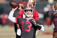 San Francisco 49ers quarterback Brock Purdy (13) throws a pass during an NFL football practice in Santa Clara, Calif., Thursday, Jan. 25, 2024. The 49ers are scheduled to play the Detroit Lions Sunday in the NFC championship game. (AP Photo/Jeff Chiu)