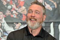 Quebec Remparts general manager and coach Patrick Roy reacts at a news conference as he announces his retirement from junior hockey, Tuesday, June 13, 2023 at the Videotron Centre in Quebec City. THE CANADIAN PRESS/Jacques Boissinot