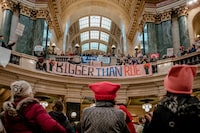 Demonstrators gather for a Bigger Than Roe rally after participating in a womenÕs march for abortion rights, at the Wisconsin State Capitol in Madison on Sunday, Jan. 22, 2023. (Jamie Kelter Davis/The New York Times)